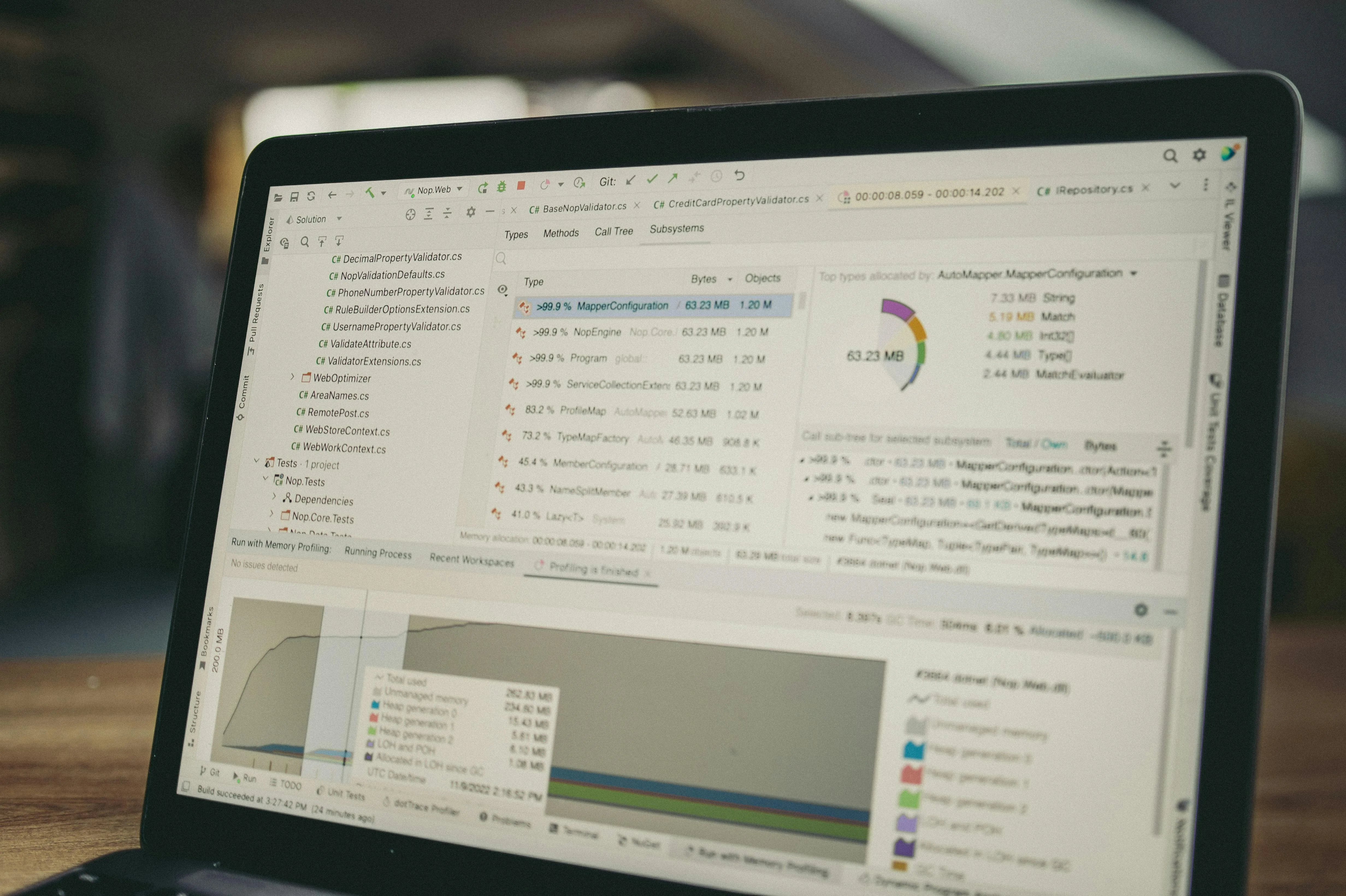 Laptop screen showing a software data analysis and coding interface representing Shopify order sync filter rules configuration